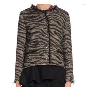 Isabel Marant Étoile Tweed Jacket Lycia Boucle
with a zebra print.